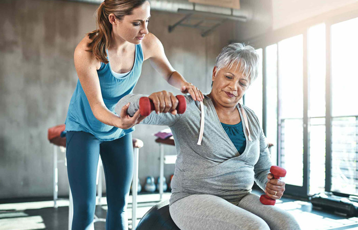 Resident lifting dumbbells